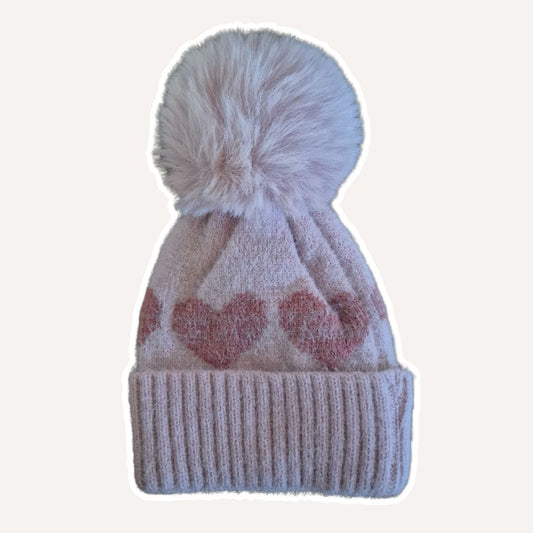 Roze muts met hartjes en pompom (en naam)