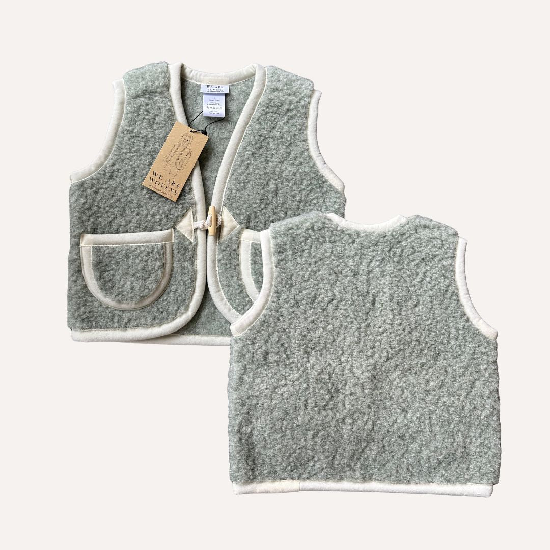 Wollen Bodywarmer met naam (verschillende kleuren) - We Are Wovens